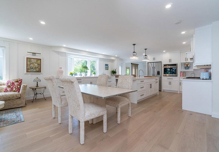 Open dining area and kitchen in a Burlington main-floor renovation by High Peaks Contracting Ltd.